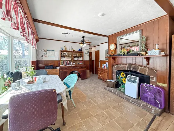 a room with refrigerator and washer
