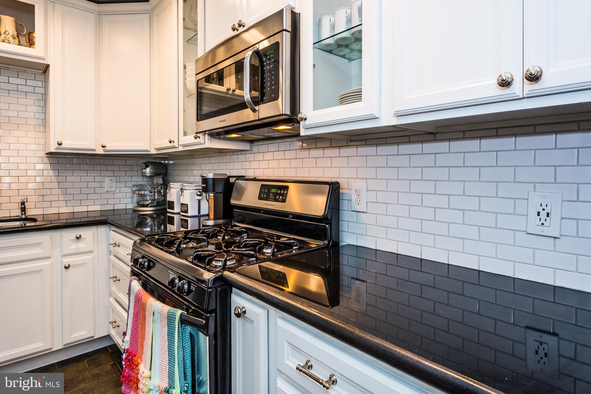 1443 Decatur Street Baltimore, MD 21230 - Photo 13 of 38 Granite Counters/Subway Backsplash