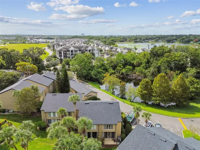 an aerial view of a house with a garden