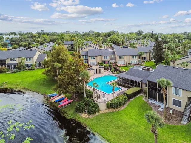 an aerial view of a house with a garden