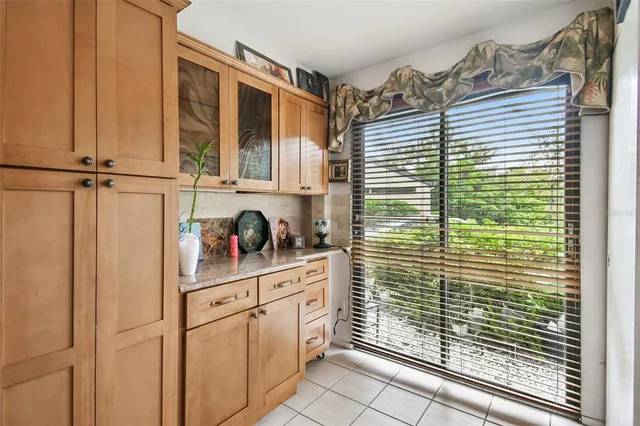 a bathroom with a shower and a sink