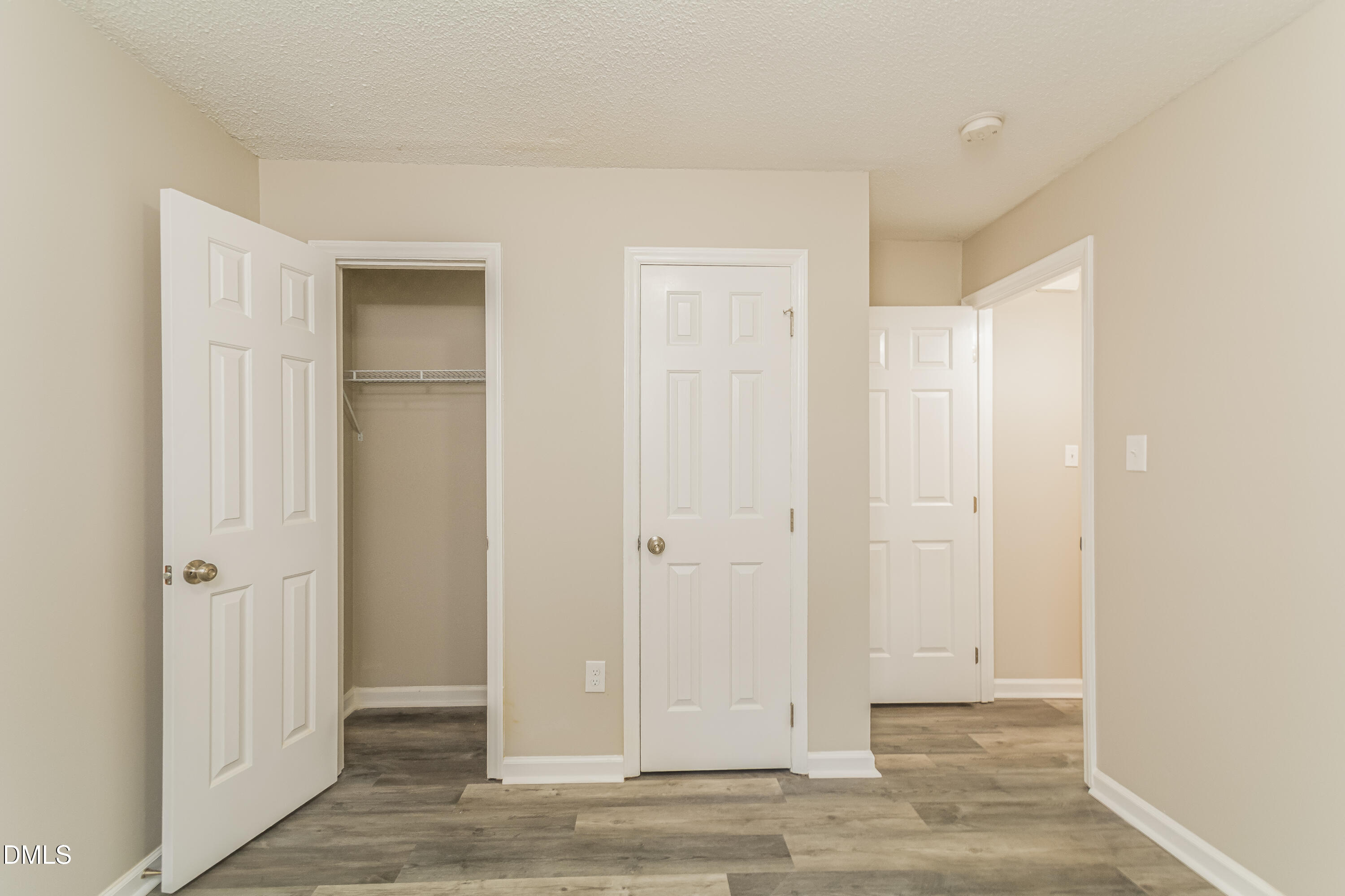 617 Bartlett Road Fuquay-Varina, NC 27526 - Photo 13 of 16 a view of a livingroom with wooden floor