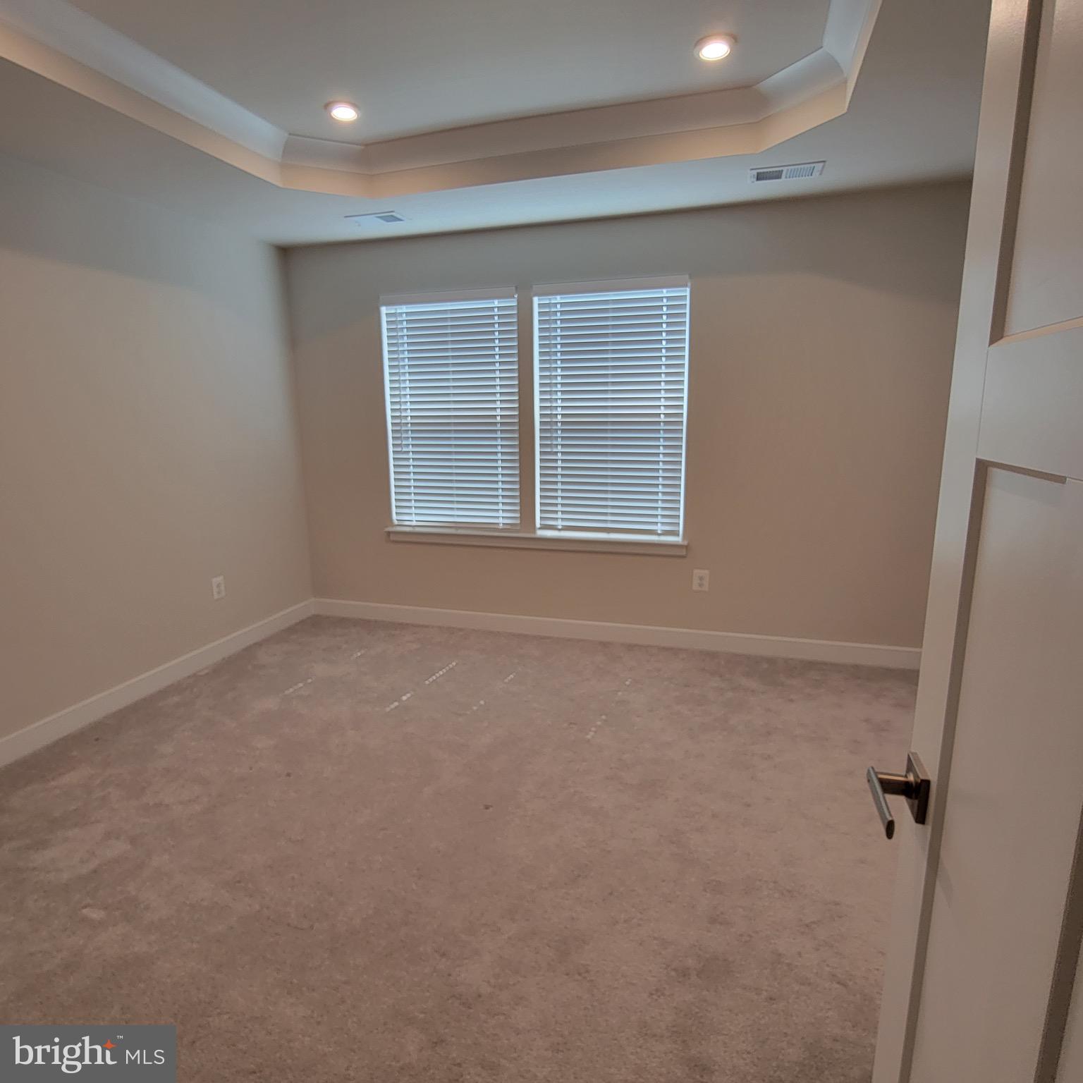140 Fletcher Circle Middletown, DE 19709 - Photo 18 of 36 an empty room with windows