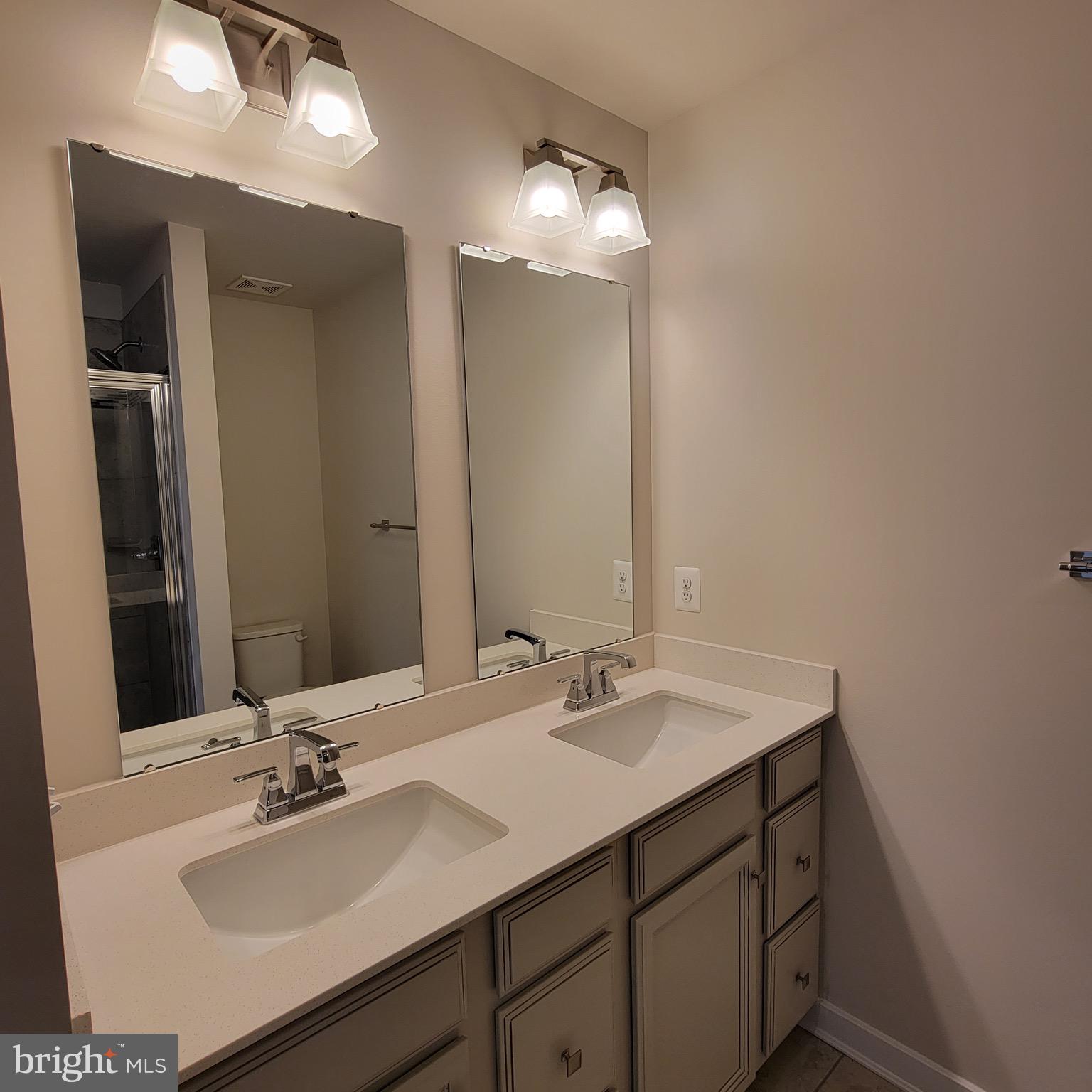 140 Fletcher Circle Middletown, DE 19709 - Photo 20 of 36 a bathroom with a sink vanity and mirror