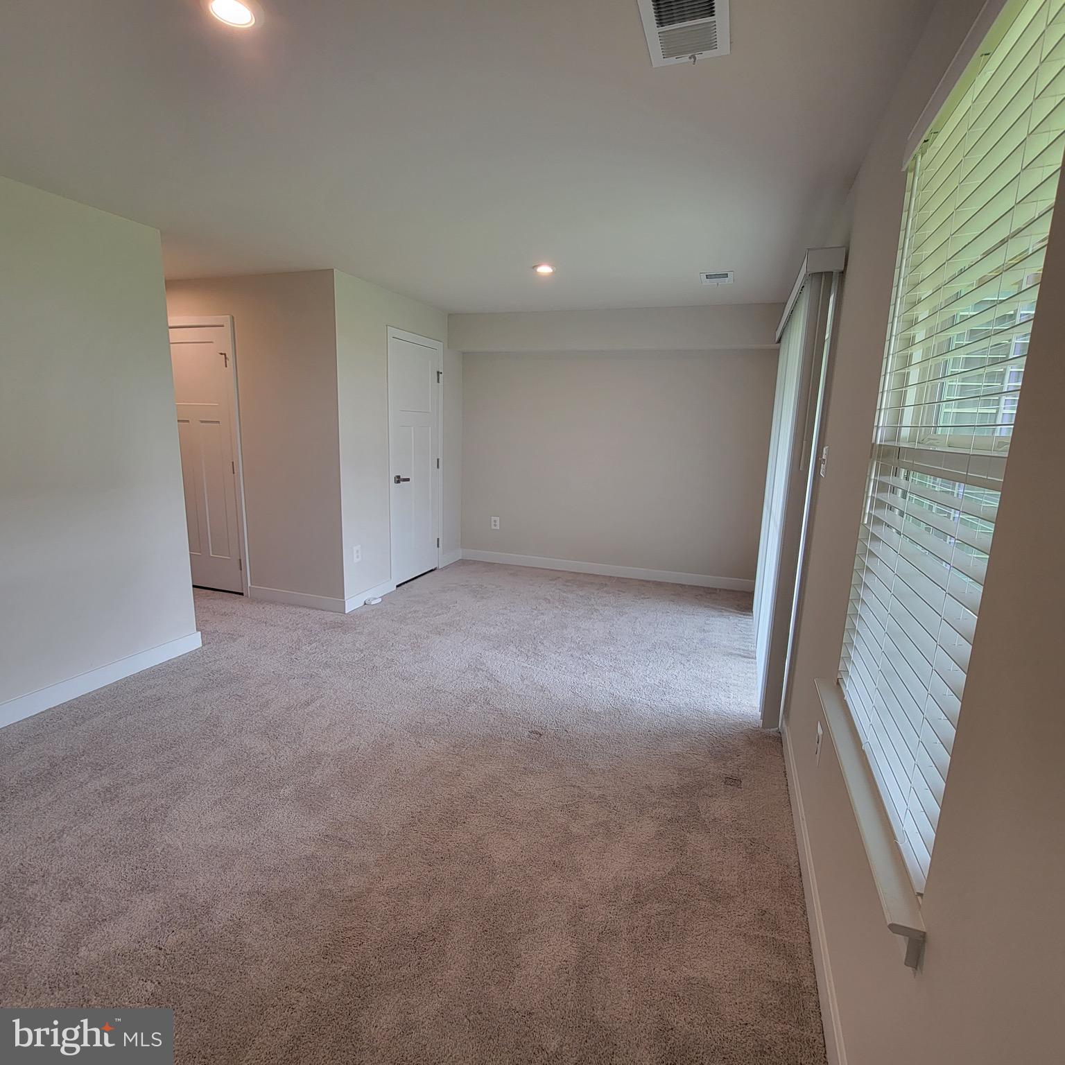 140 Fletcher Circle Middletown, DE 19709 - Photo 6 of 36 a view of an empty room and a window
