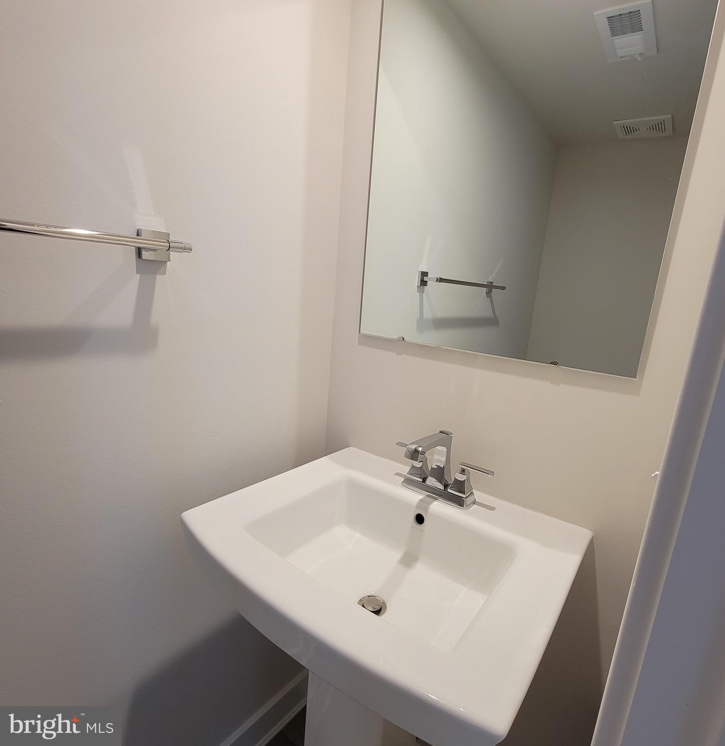 140 Fletcher Circle Middletown, DE 19709 - Photo 7 of 36 a white sink sitting next to a white sink