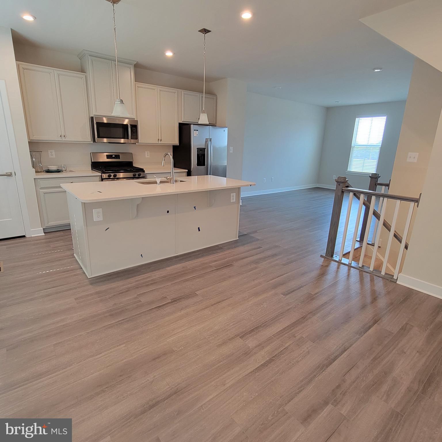 140 Fletcher Circle Middletown, DE 19709 - Photo 10 of 36 a kitchen with stainless steel appliances a refrigerator sink and microwave