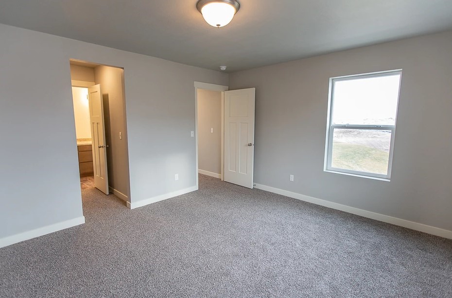 21155 Gosling Road, Unit 47B Spring, TX 77388 - Photo 12 of 29 an empty room with windows and closet