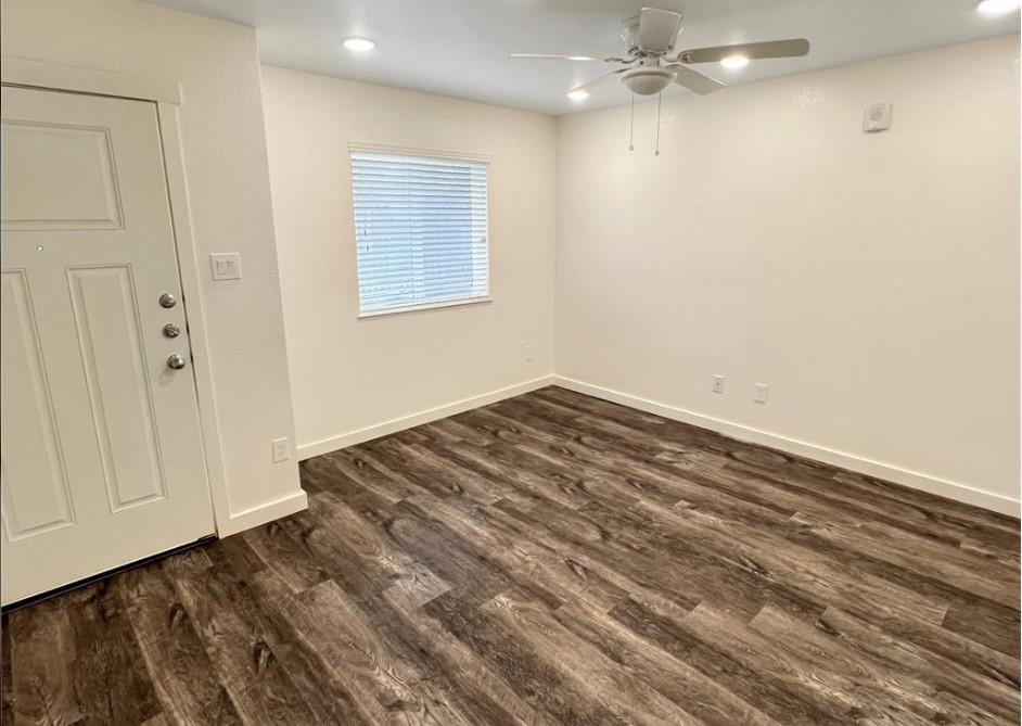 21155 Gosling Road, Unit 47B Spring, TX 77388 - Photo 3 of 29 a view of a room with wooden floor and fan