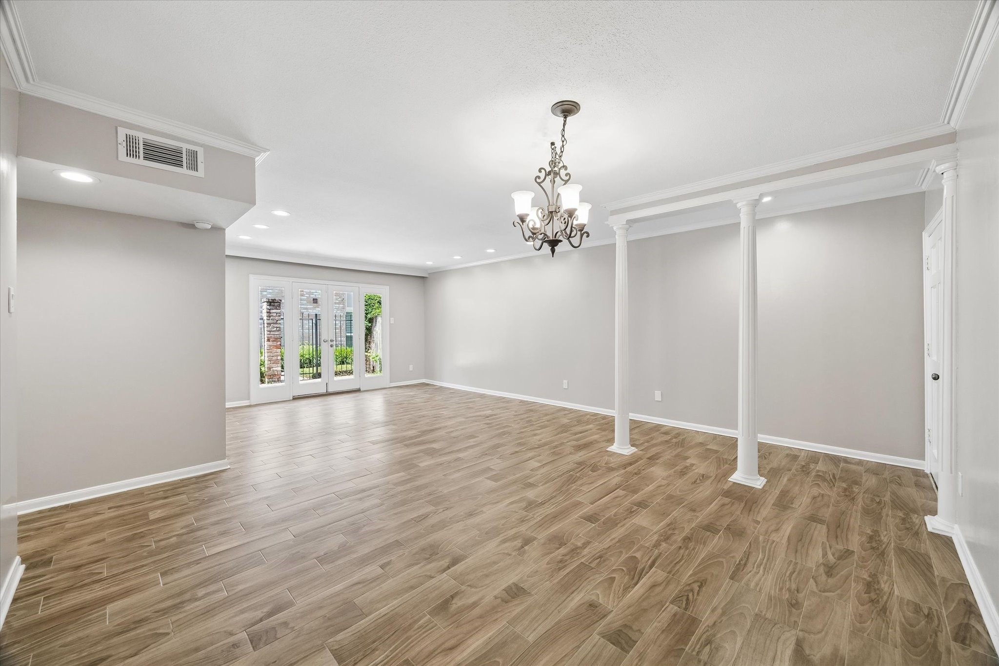 2230 South Piney Point Road, Unit 103 Houston, TX 77063 - Photo 6 of 28 View from the kitchen looking to the Living and patio.