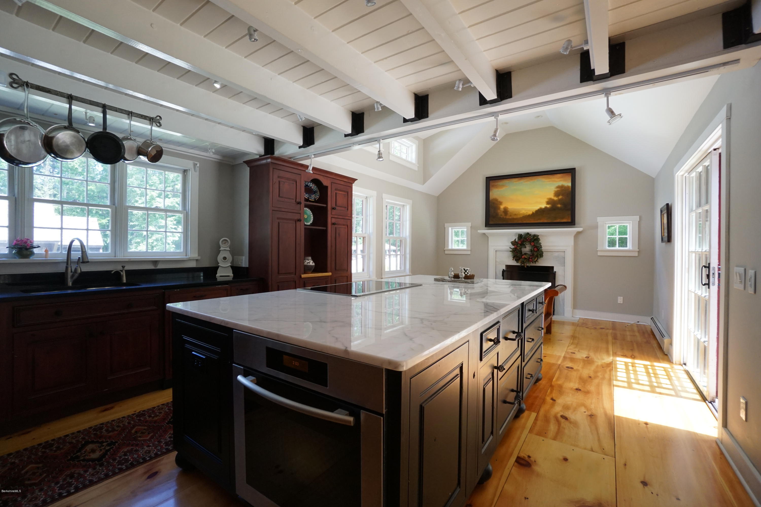 408 Summit Road Richmond, MA 01254 - Photo 12 of 36 a kitchen with a stove and a sink