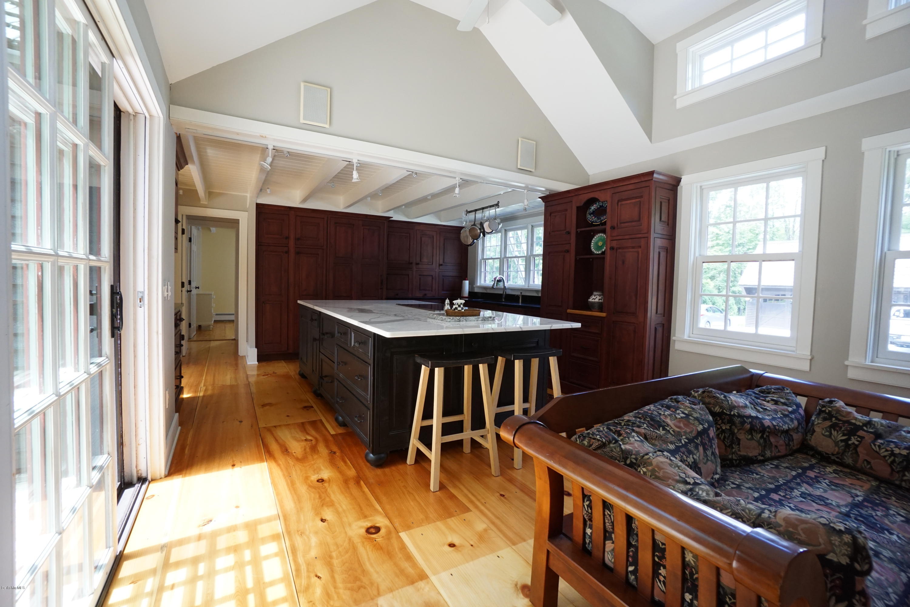 408 Summit Road Richmond, MA 01254 - Photo 13 of 36 a living room with stainless steel appliances furniture a rug and a window