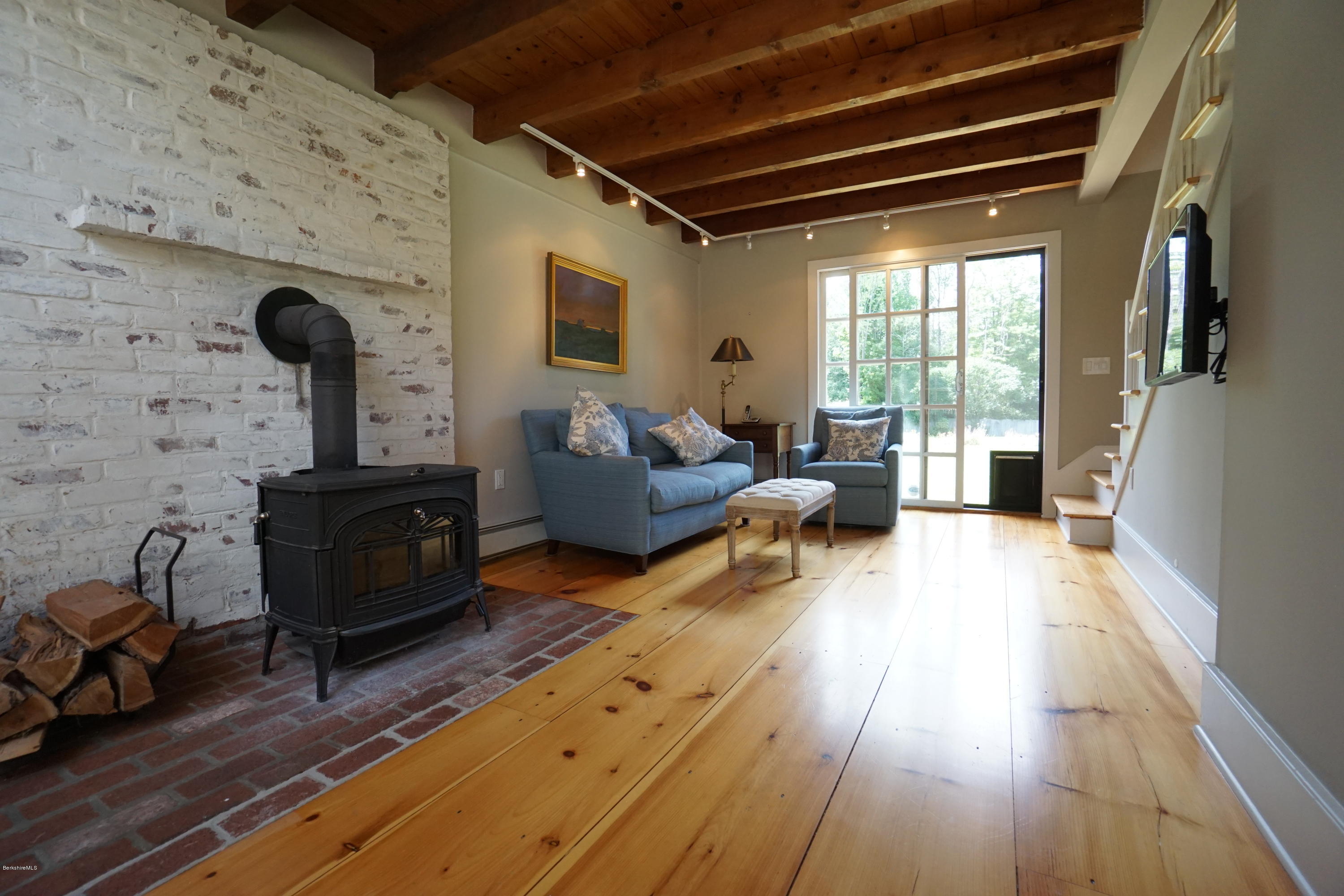 408 Summit Road Richmond, MA 01254 - Photo 16 of 36 a living room with furniture and wooden floor