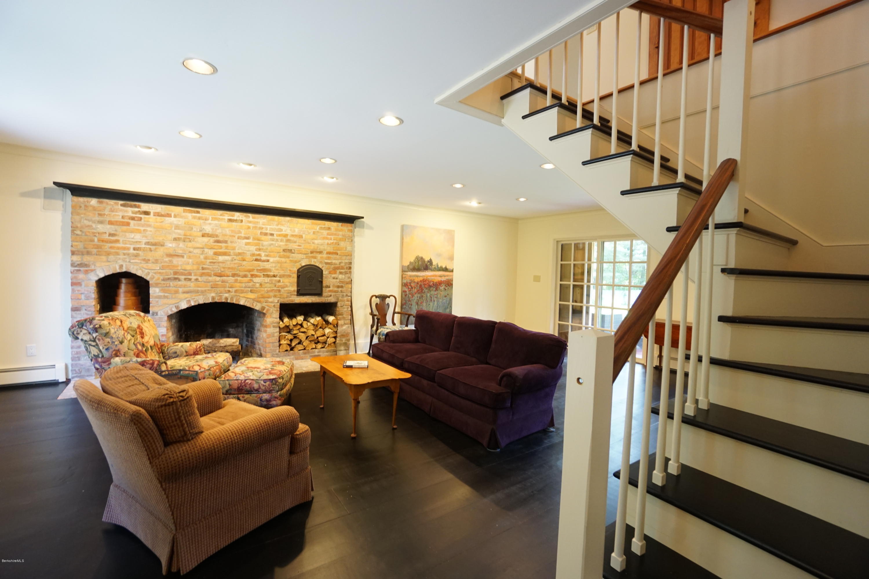 408 Summit Road Richmond, MA 01254 - Photo 22 of 36 a living room with fireplace furniture and a flat screen tv