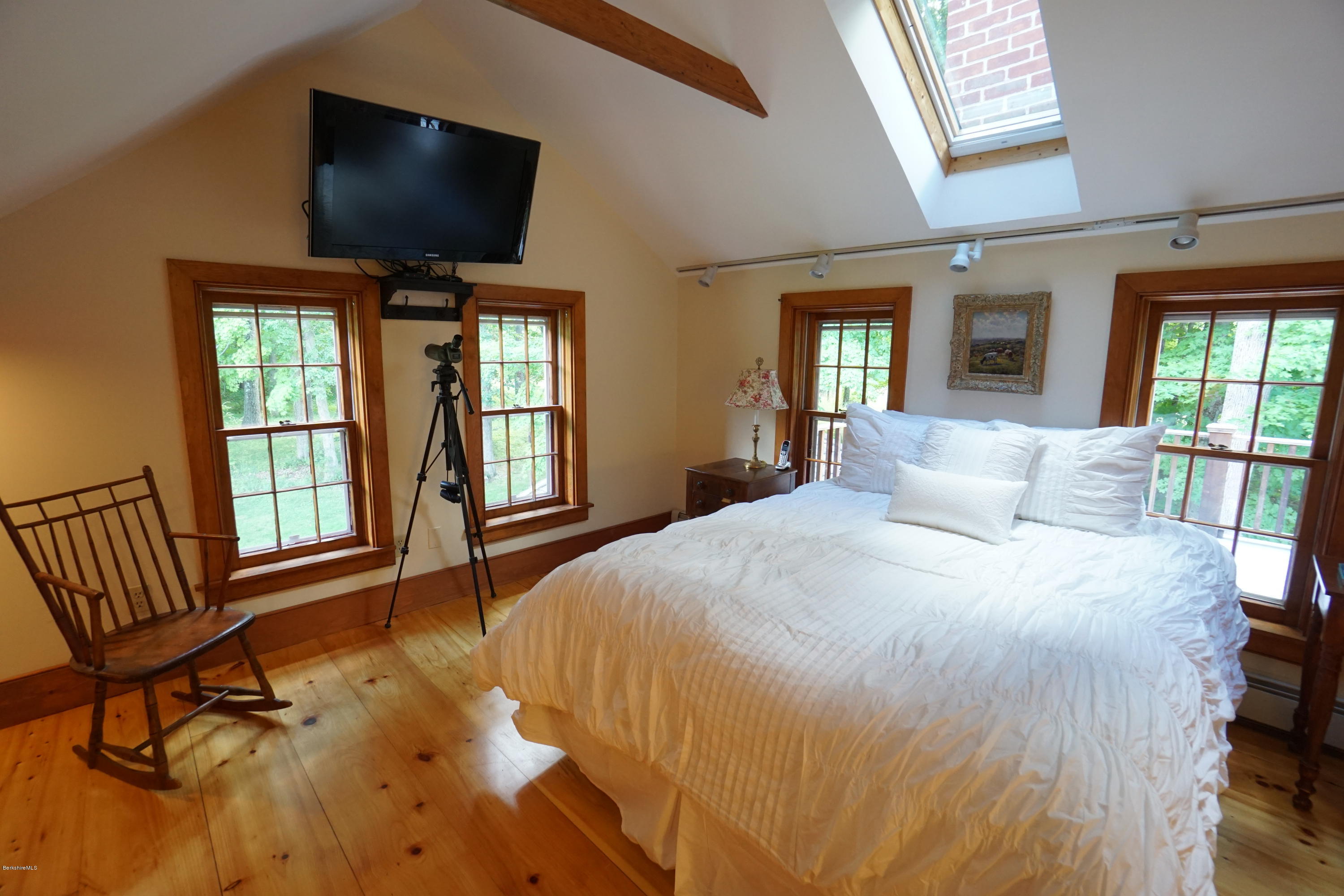 408 Summit Road Richmond, MA 01254 - Photo 24 of 36 a bedroom with a bed tv and a window
