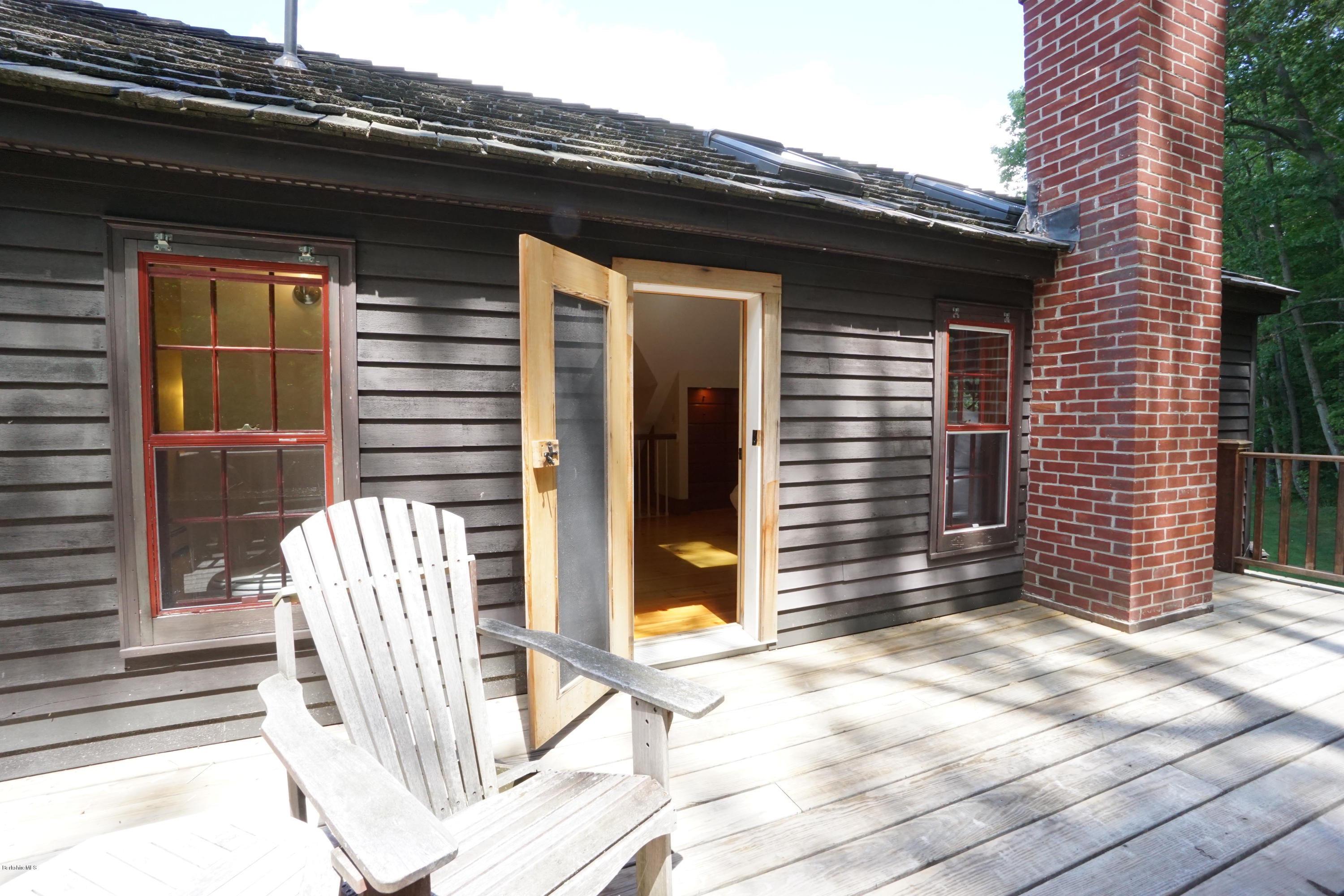 408 Summit Road Richmond, MA 01254 - Photo 26 of 36 a front view of a house with a porch