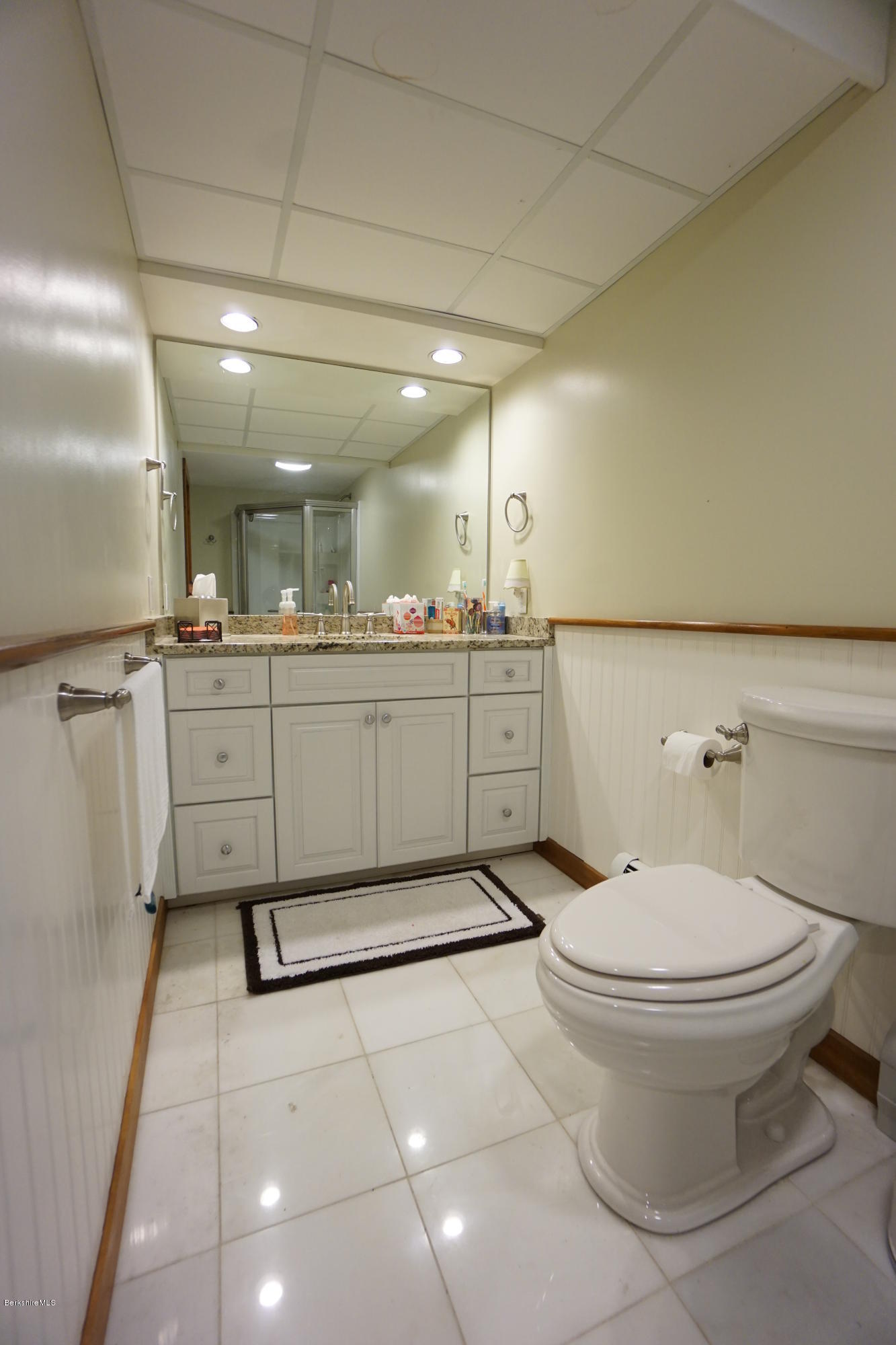 408 Summit Road Richmond, MA 01254 - Photo 32 of 36 a bathroom with a sink a toilet and mirror