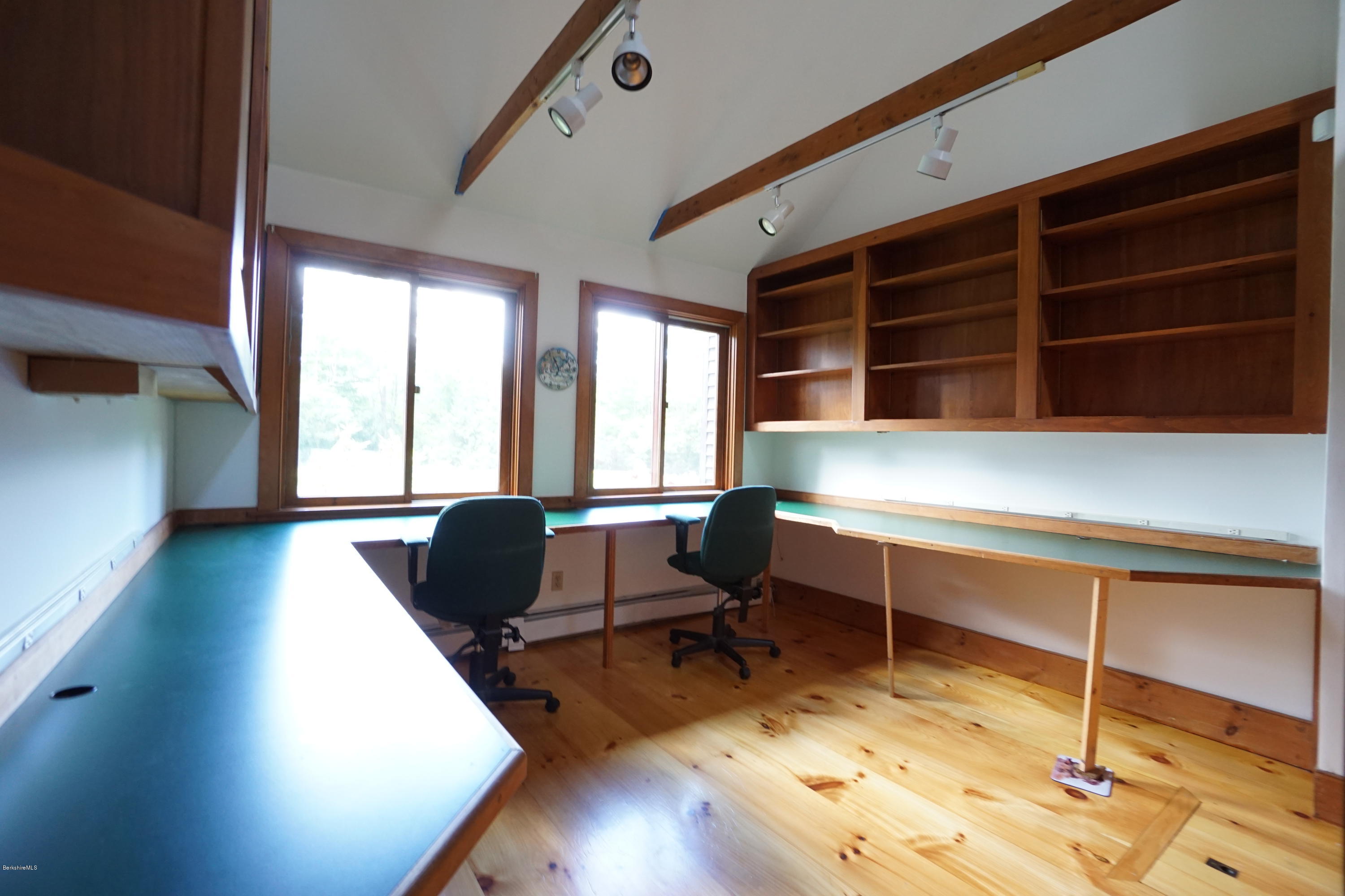 408 Summit Road Richmond, MA 01254 - Photo 9 of 36 a view of a workspace with furniture and a window