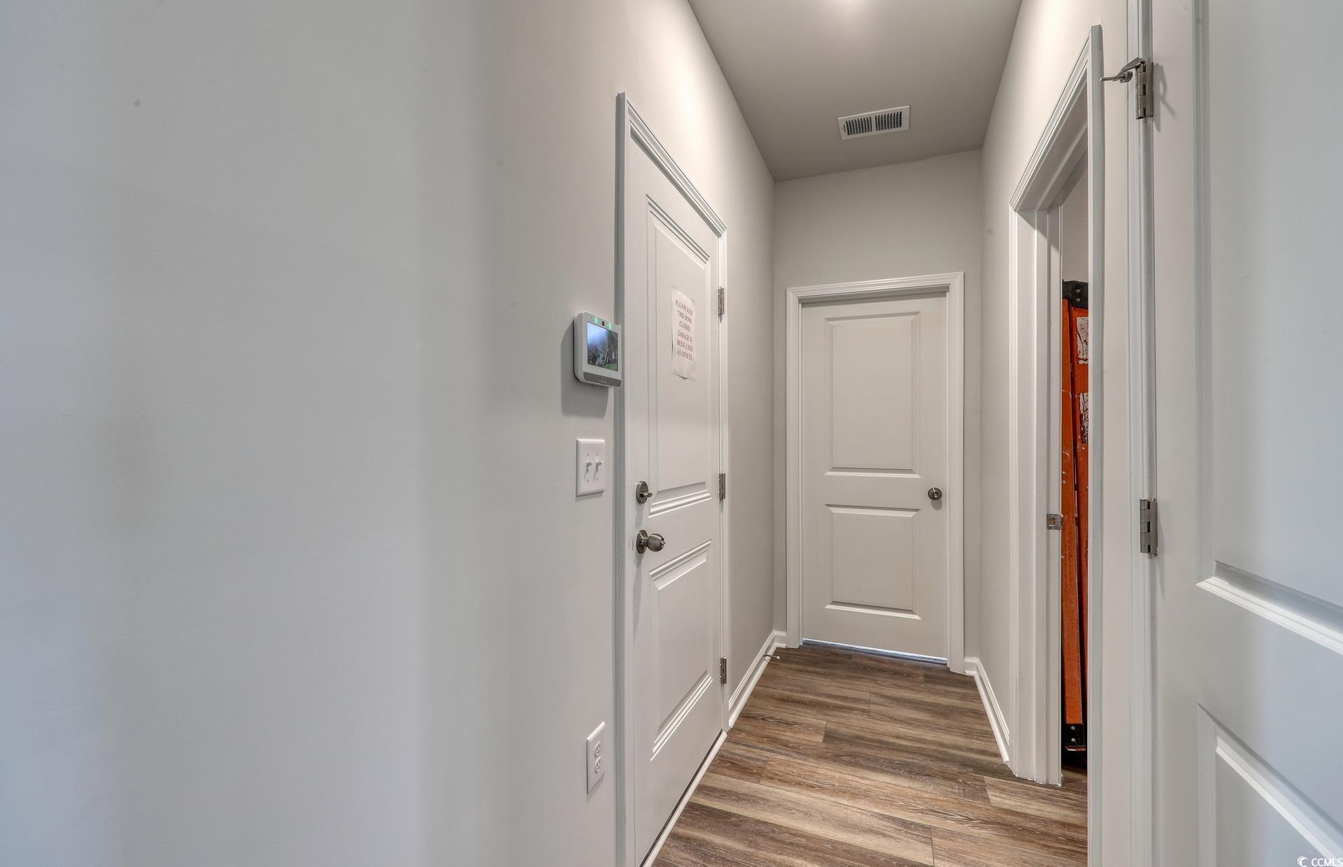 978 Laconic Drive Myrtle Beach, SC 29588 - Photo 7 of 19 Hall with hardwood / wood-style flooring