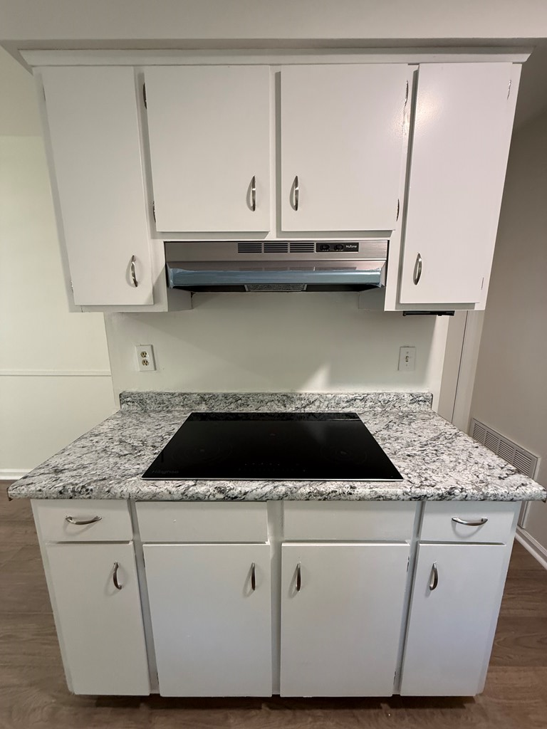 4355 Byron Street Columbus, GA 31907 - Photo 3 of 20 a kitchen with white cabinets and a sink