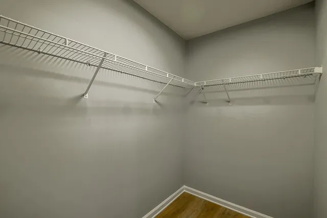 a view of a room with racks on the wall