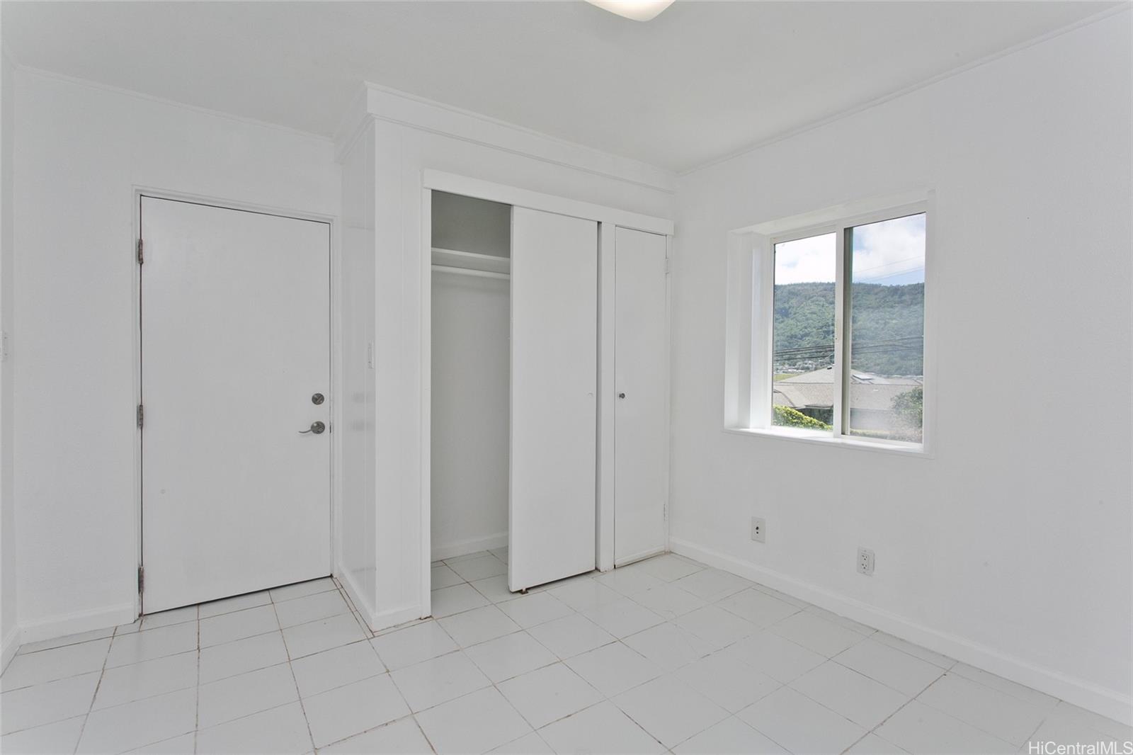 2742 Manoa Road Honolulu, HI 96822 - Photo 23 of 25 Downstairs Second Bedroom