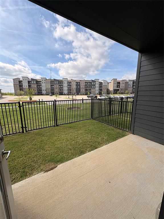 3751 Heritage Towne Blvd. Boulevard Midlothian, TX 76065 - Photo 13 of 20 a view of a yard with a wooden fence