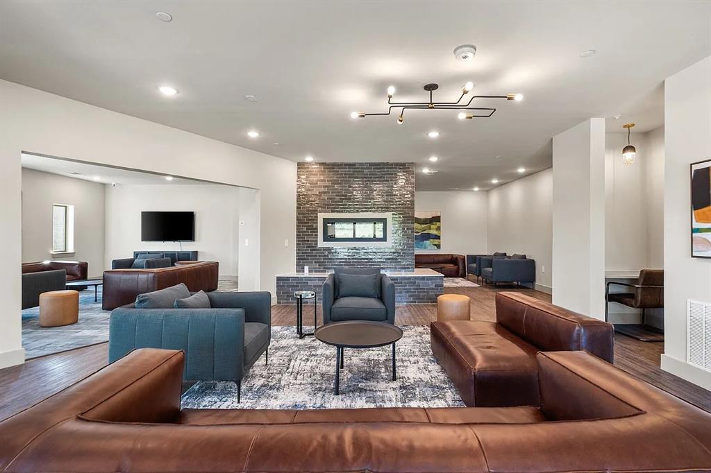 3751 Heritage Towne Blvd. Boulevard Midlothian, TX 76065 - Photo 18 of 20 a living room with furniture and a flat screen tv