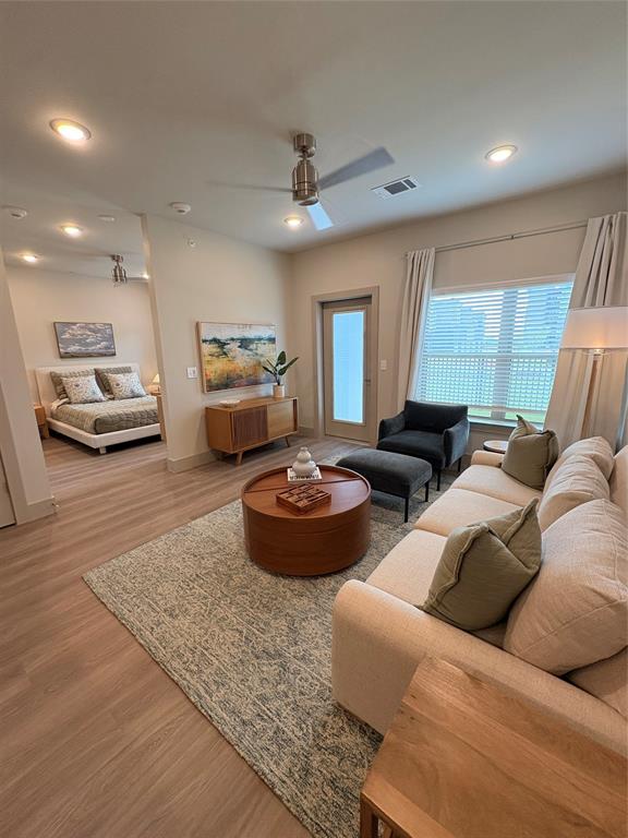 3751 Heritage Towne Blvd. Boulevard Midlothian, TX 76065 - Photo 5 of 20 a living room with furniture and a wooden floor
