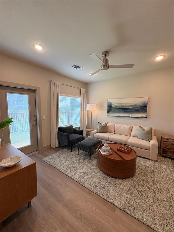 3751 Heritage Towne Blvd. Boulevard Midlothian, TX 76065 - Photo 6 of 20 a living room with furniture and a couch