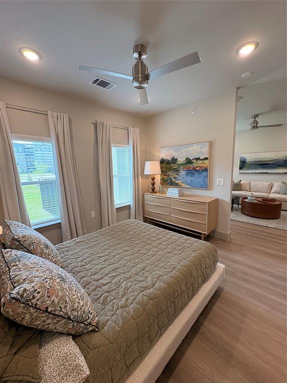 3751 Heritage Towne Blvd. Boulevard Midlothian, TX 76065 - Photo 7 of 20 a bedroom with a large bed and a chandelier