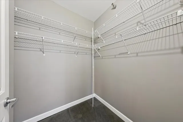 a view of a room with racks on the wall