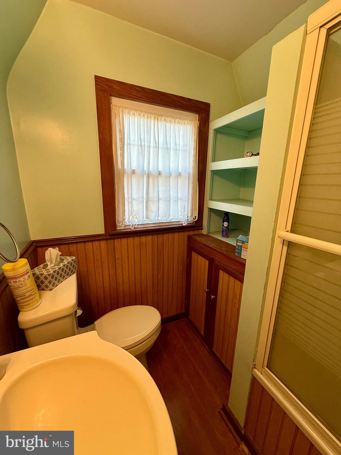 13925 Ellerslie Road Ellerslie, MD 21529 - Photo 11 of 12 a bathroom with a sink and a mirror