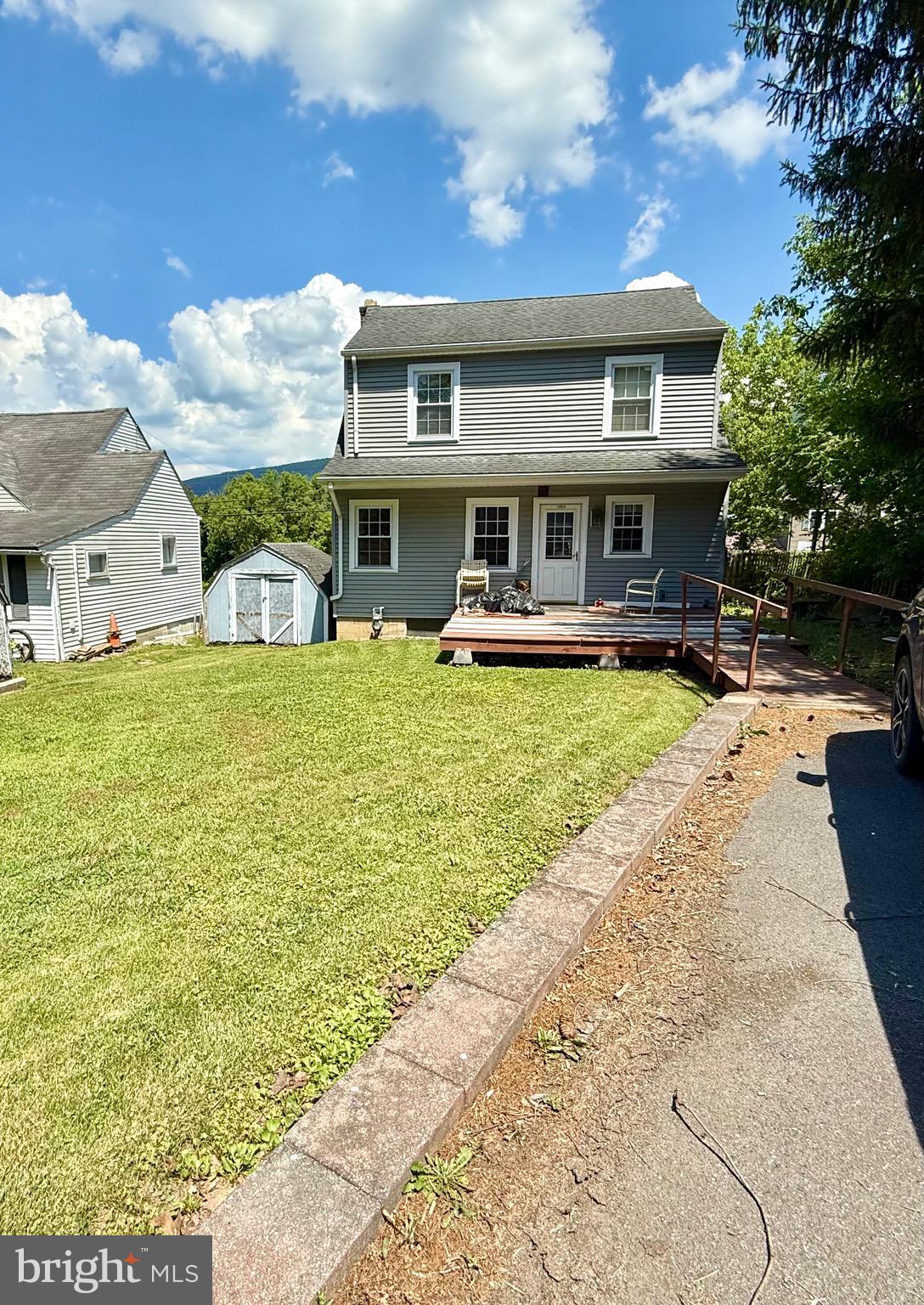 13925 Ellerslie Road Ellerslie, MD 21529 - Photo 3 of 12 a view of a house with swimming pool and sitting area