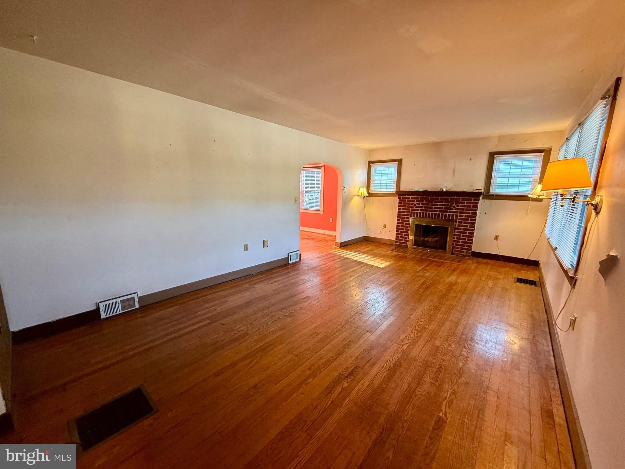 13925 Ellerslie Road Ellerslie, MD 21529 - Photo 6 of 12 a view of empty room with wooden floor
