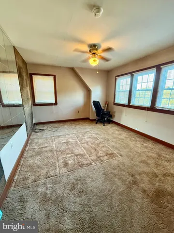 a view of a hallway with a window