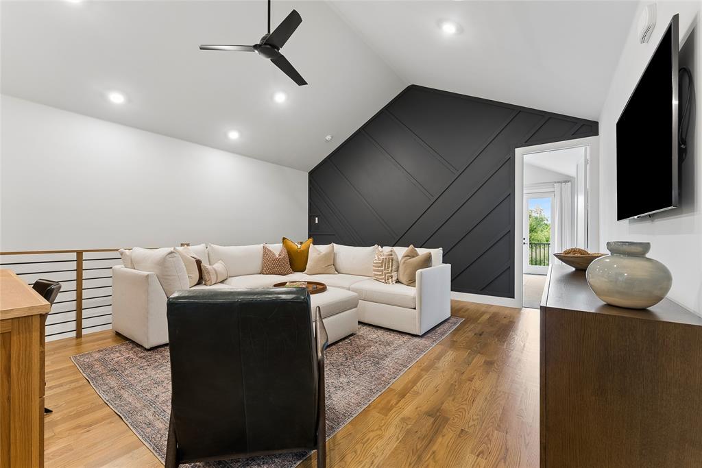 3922 Redding Row Dallas, TX 75220 - Photo 21 of 35 a living room with furniture and a flat screen tv