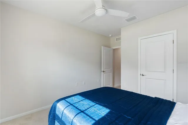 an empty room with wooden floor