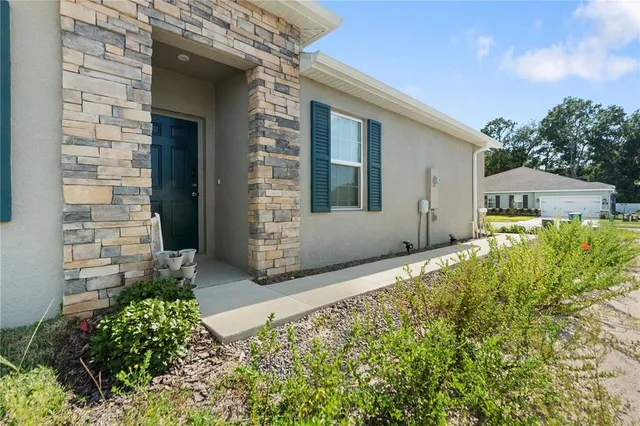 a front view of house with yard