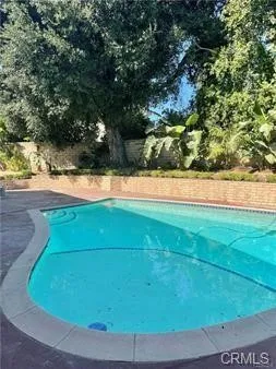 a view of a yard with an outdoor space