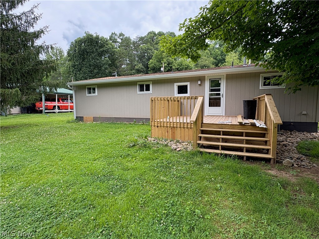 1448 Winding Road Parkersburg, WV 26104 - Photo 11 of 12 Newly constructed wood deck with multi-level steps