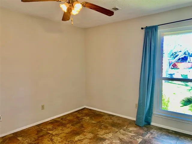a view of empty room with window