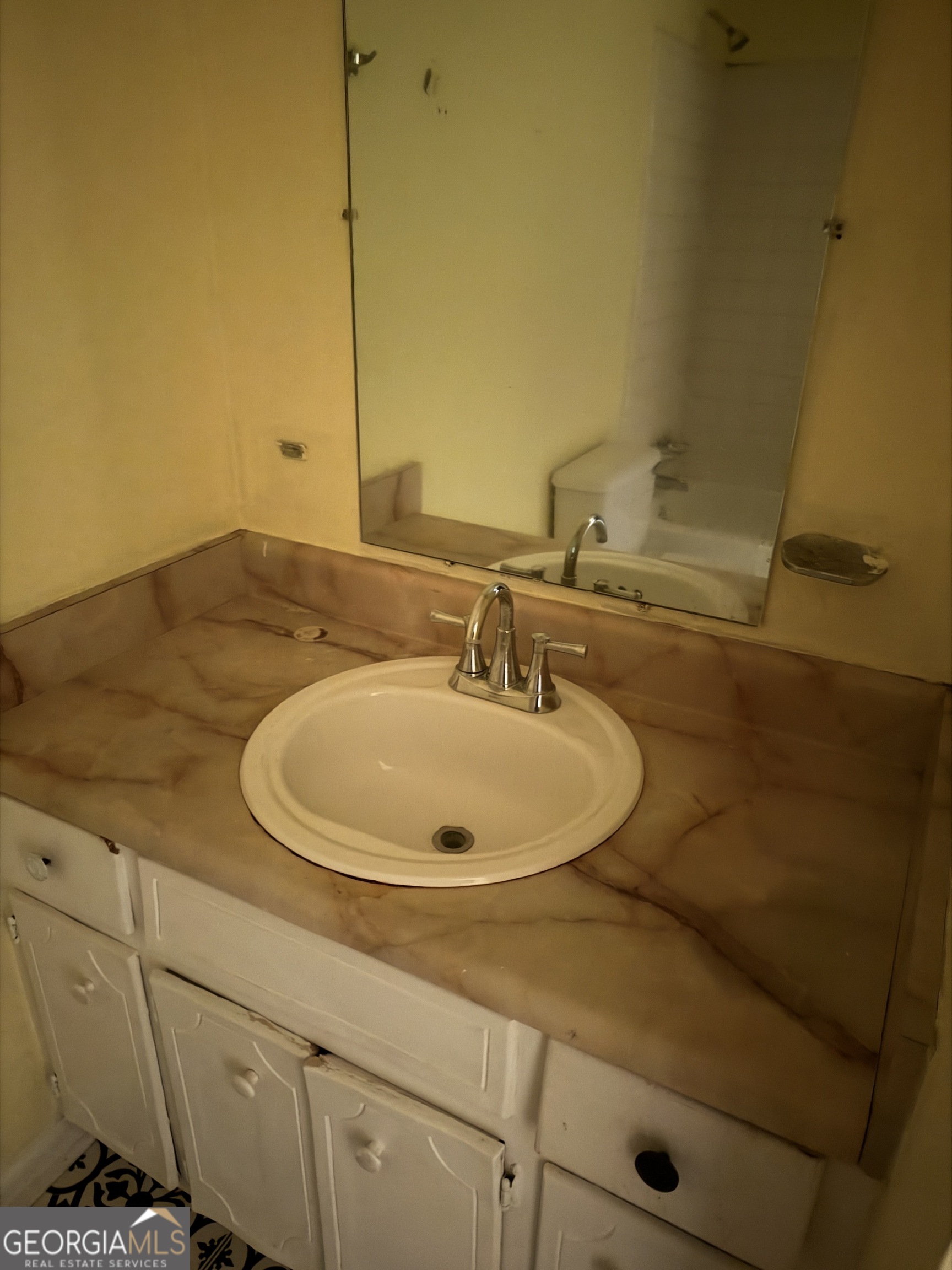3523 Morgan Road Hephzibah, GA 30815 - Photo 7 of 15 a bathroom with a sink and mirror