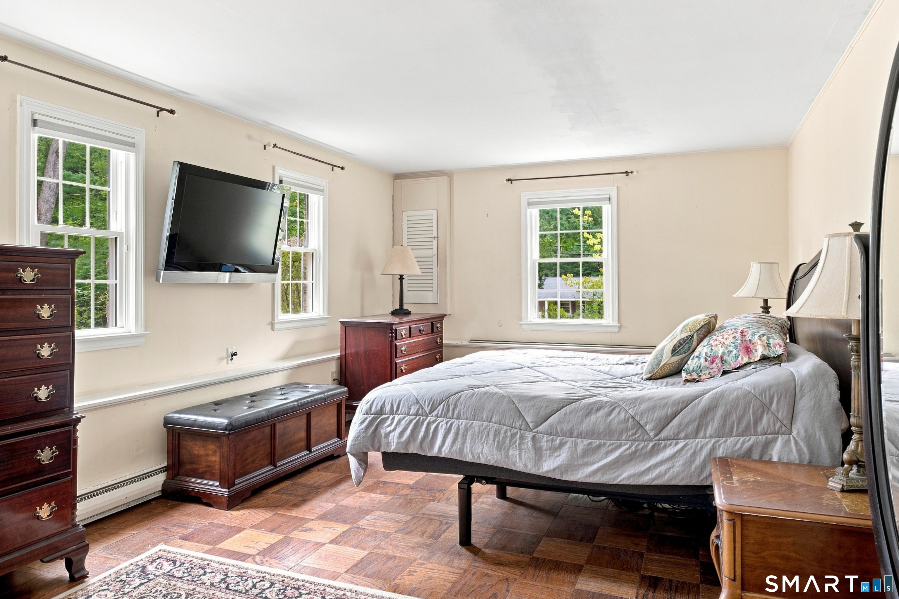 38 Church Lane Madison, CT 06443 - Photo 26 of 40 Large lower level bedroom with parquet floors and lots of light.
