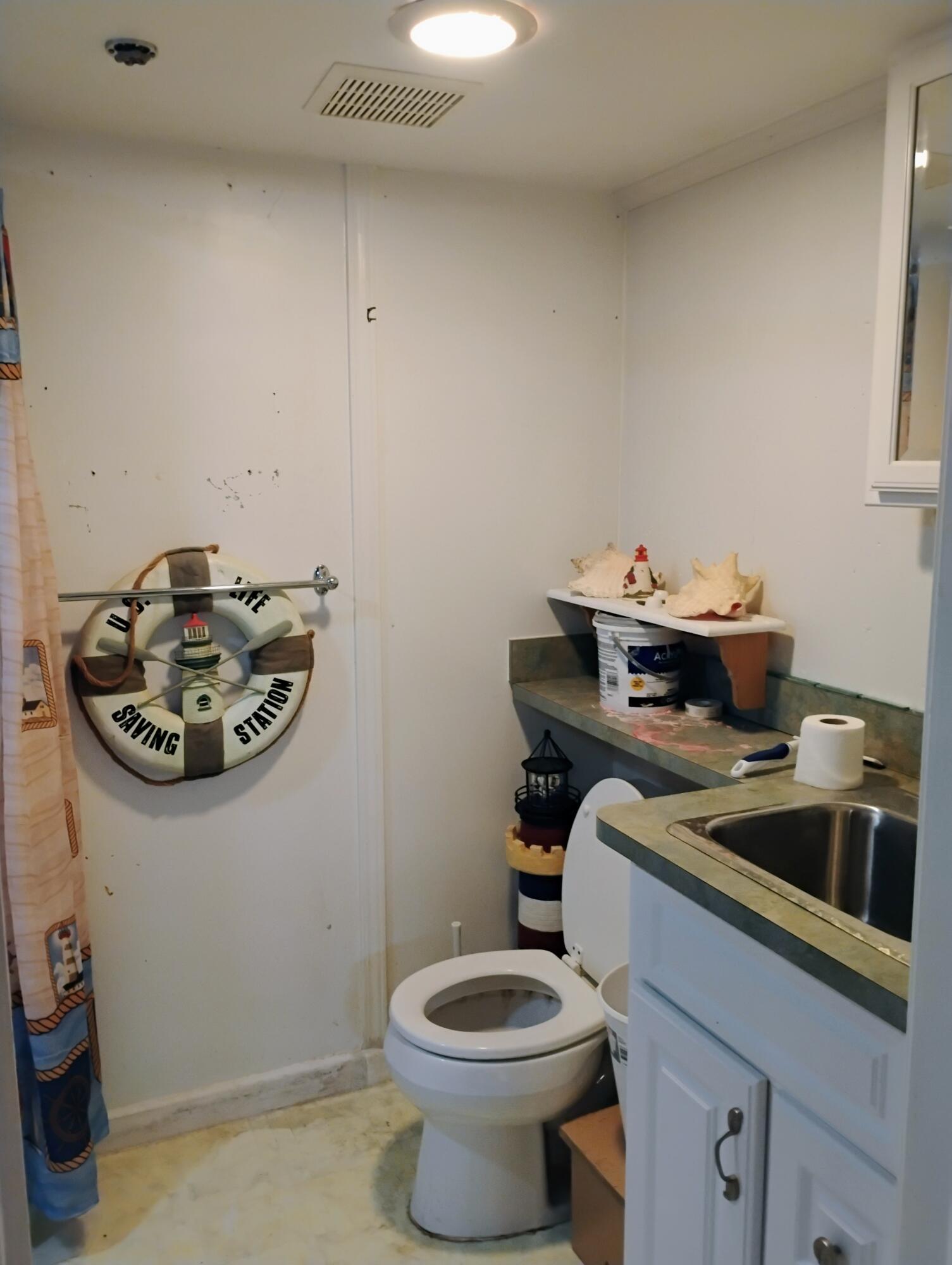 12415 Clinton River Road Sterling Heights, MI 48313 - Photo 17 of 27 12415 Clinton Basement Full Bath1