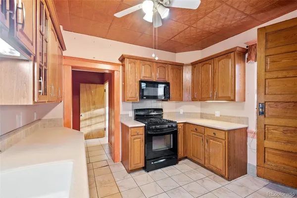a view of a kitchen with a sink