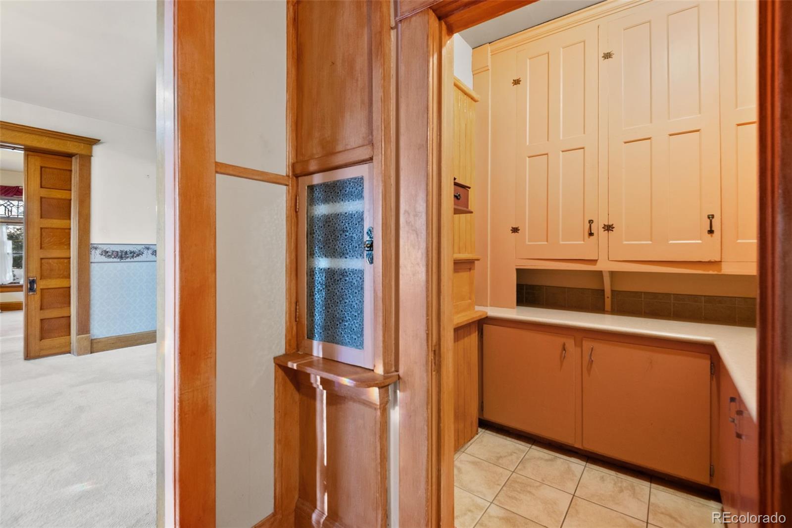 303 South 3rd Street Sterling, CO 80751 - Photo 14 of 50 a view of a kitchen with a sink