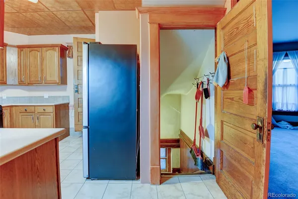 a view of a hallway with a yellow space