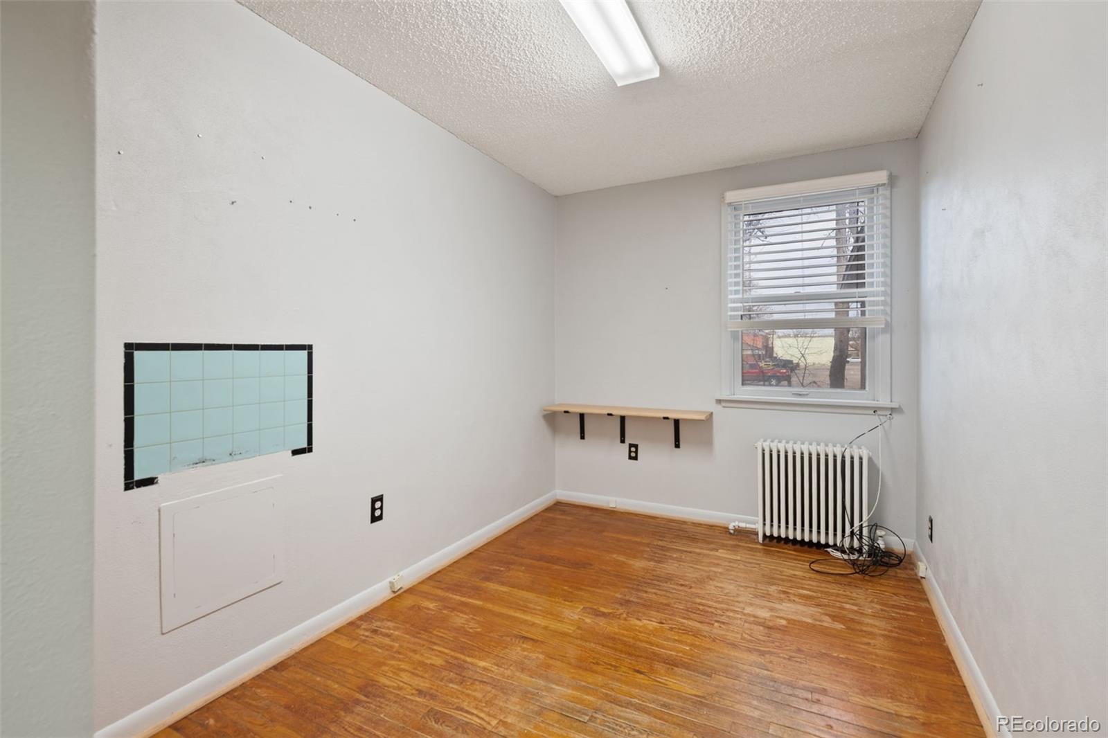 303 South 3rd Street Sterling, CO 80751 - Photo 22 of 50 a view of an empty room with a window