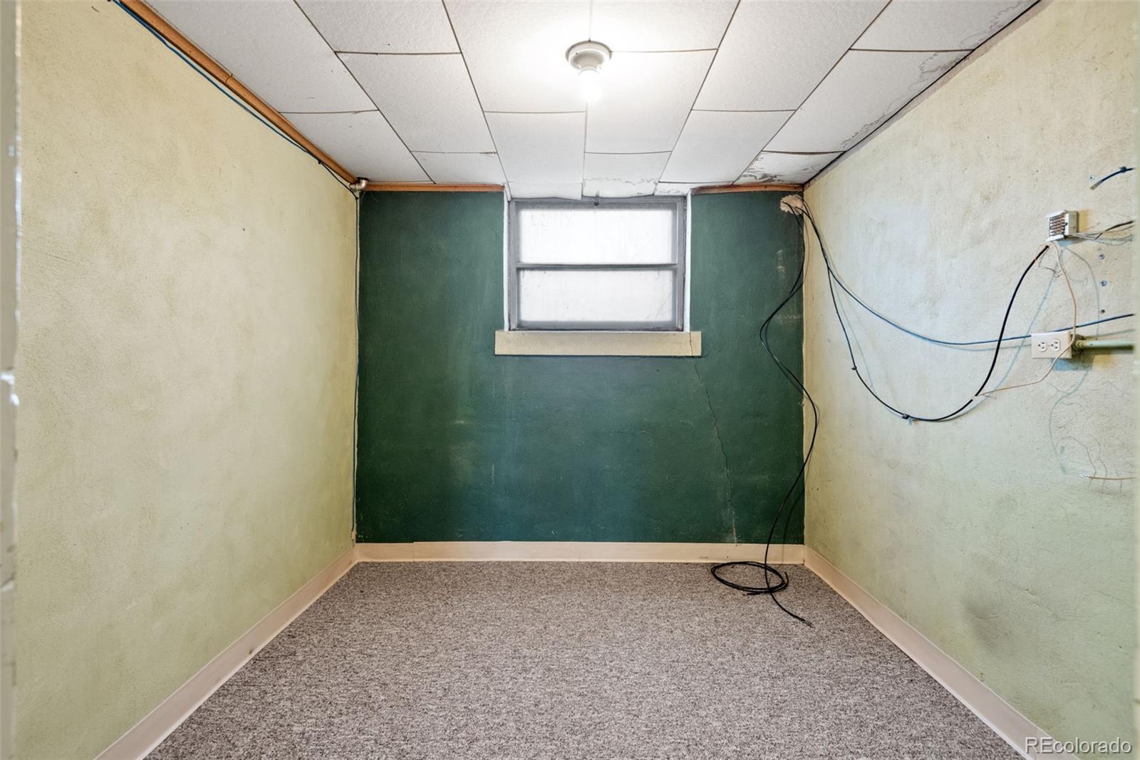 303 South 3rd Street Sterling, CO 80751 - Photo 42 of 50 a view of an empty room with a window